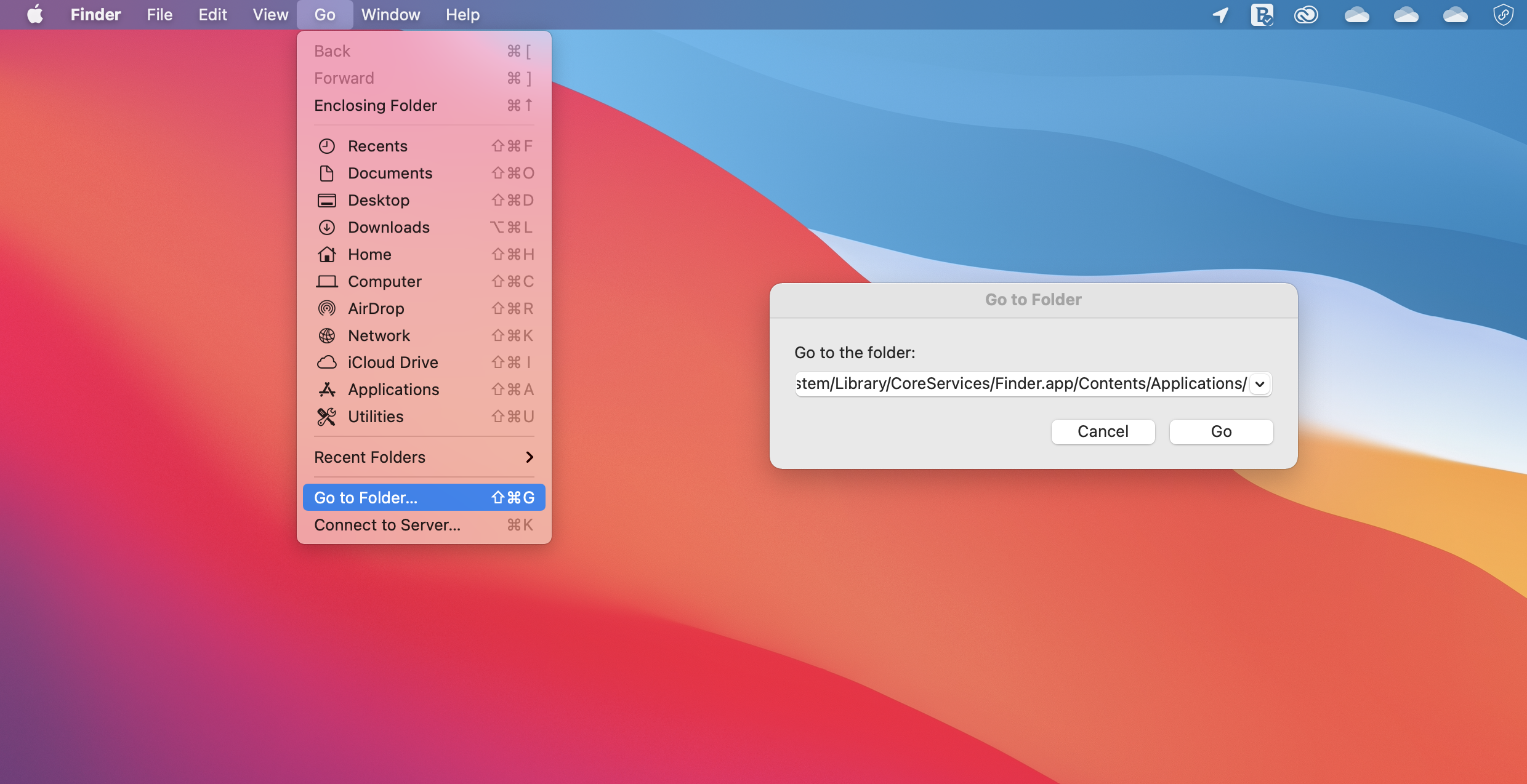 Pasting the pathway address in the Go to Folder... > Enter a path field.